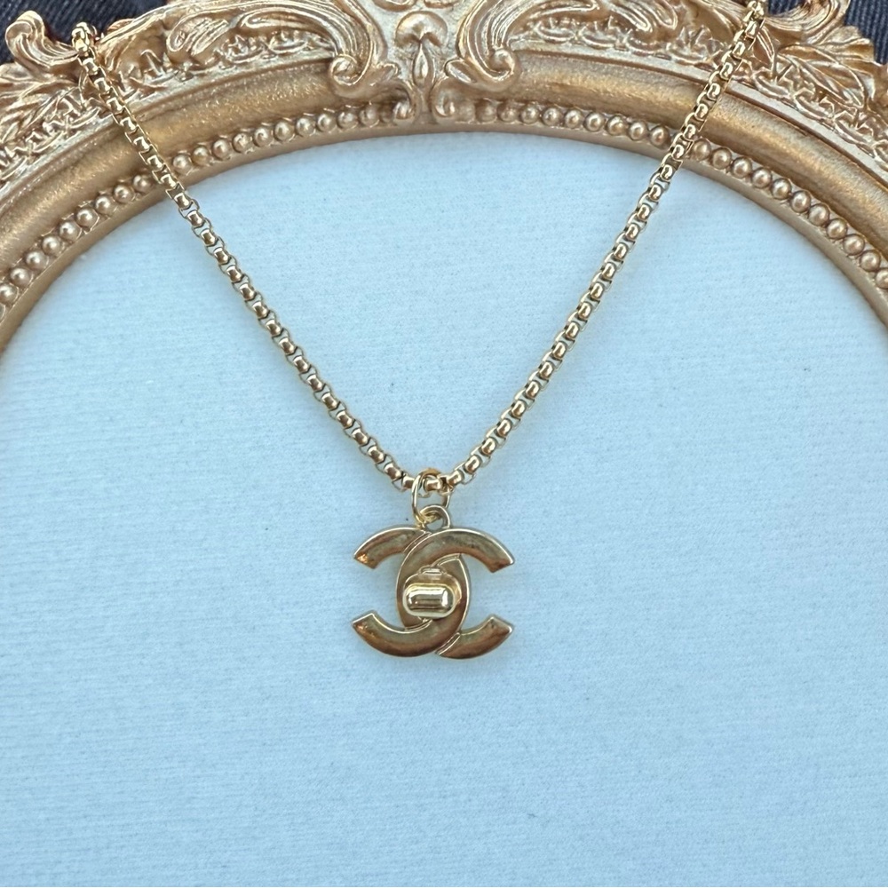 Upcycled Gold Logo Necklace on 18” stainless steel gold plated chain